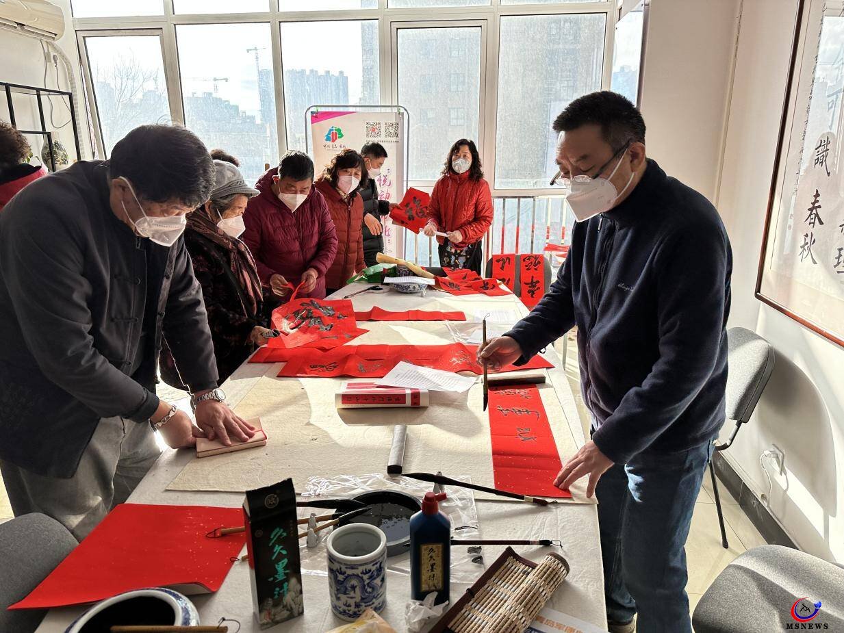 市北區(qū)大港街道開展“翰墨飄香迎新春”寫福送?；顒? title=